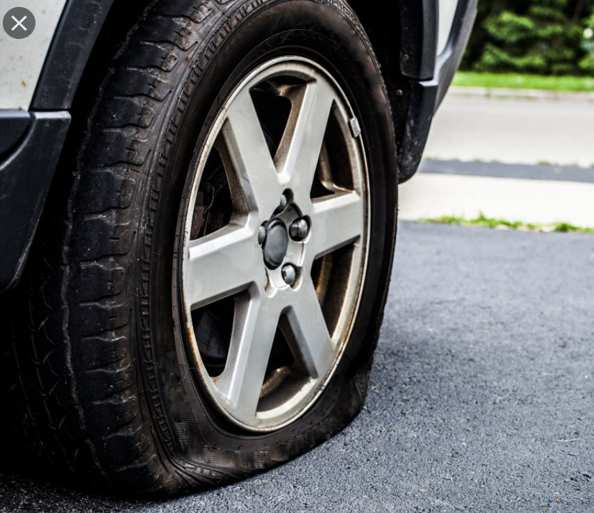 https://www.example.com/image-of-truck-tires-being-inflated.jpg